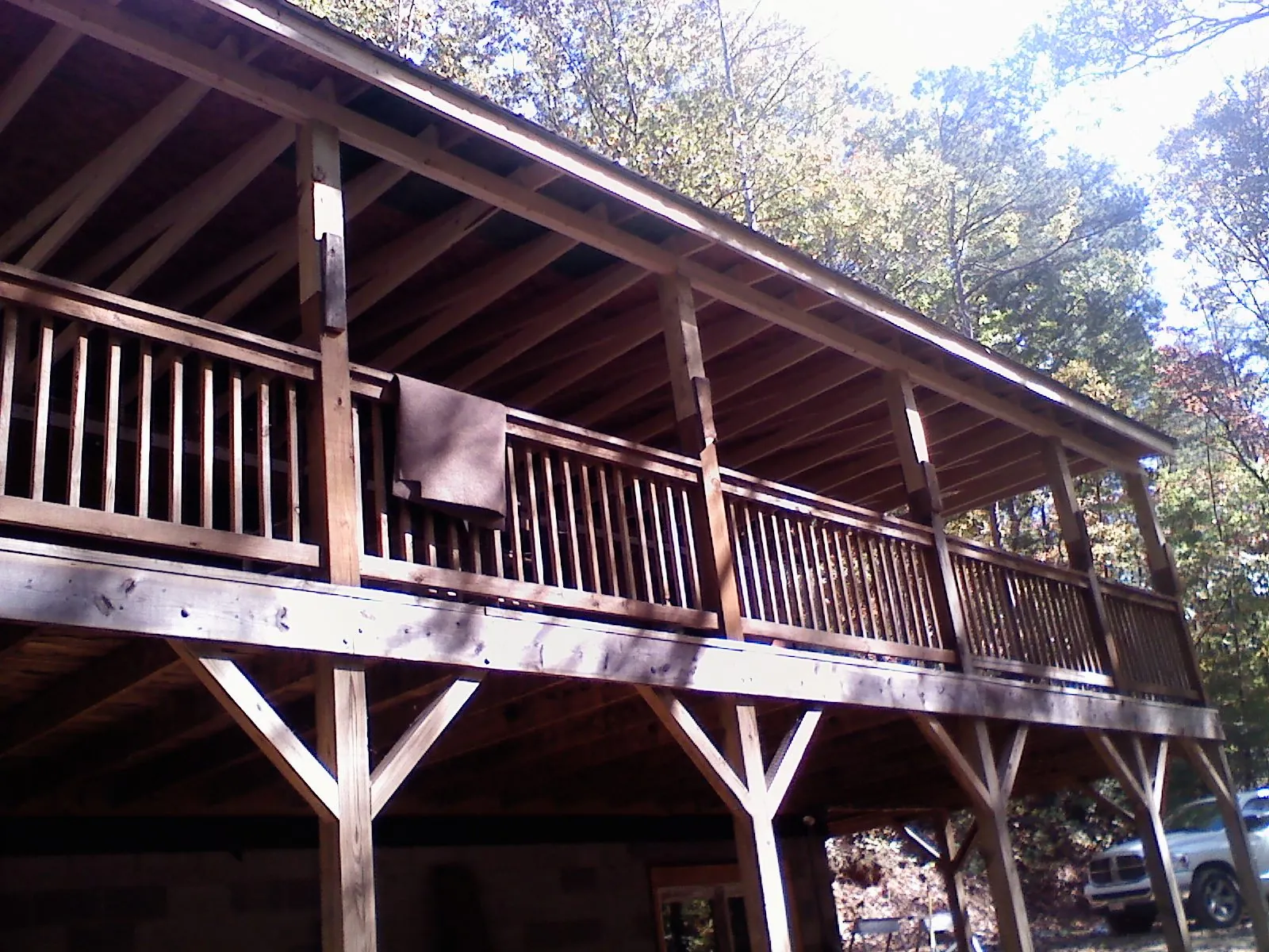 Timber framing under a new elevated porch and deck — Roof Leak Repair in Delray Beach by Roofing Brothers